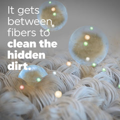 Tide Ultra Hygienic Clean liquid pouring from bottle to show concentrated texture and flow