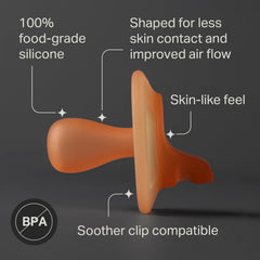 Tommee Tippee curved shield profile demonstrating ergonomic fit to baby face