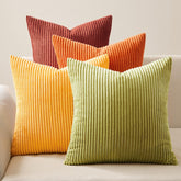 Topfinel front view of four 18x18 inch decorative covers, shows set cohesion and colors