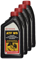 Toyota ATF WS bottle pouring into transmission funnel illustrates clean, correct fluid top-off