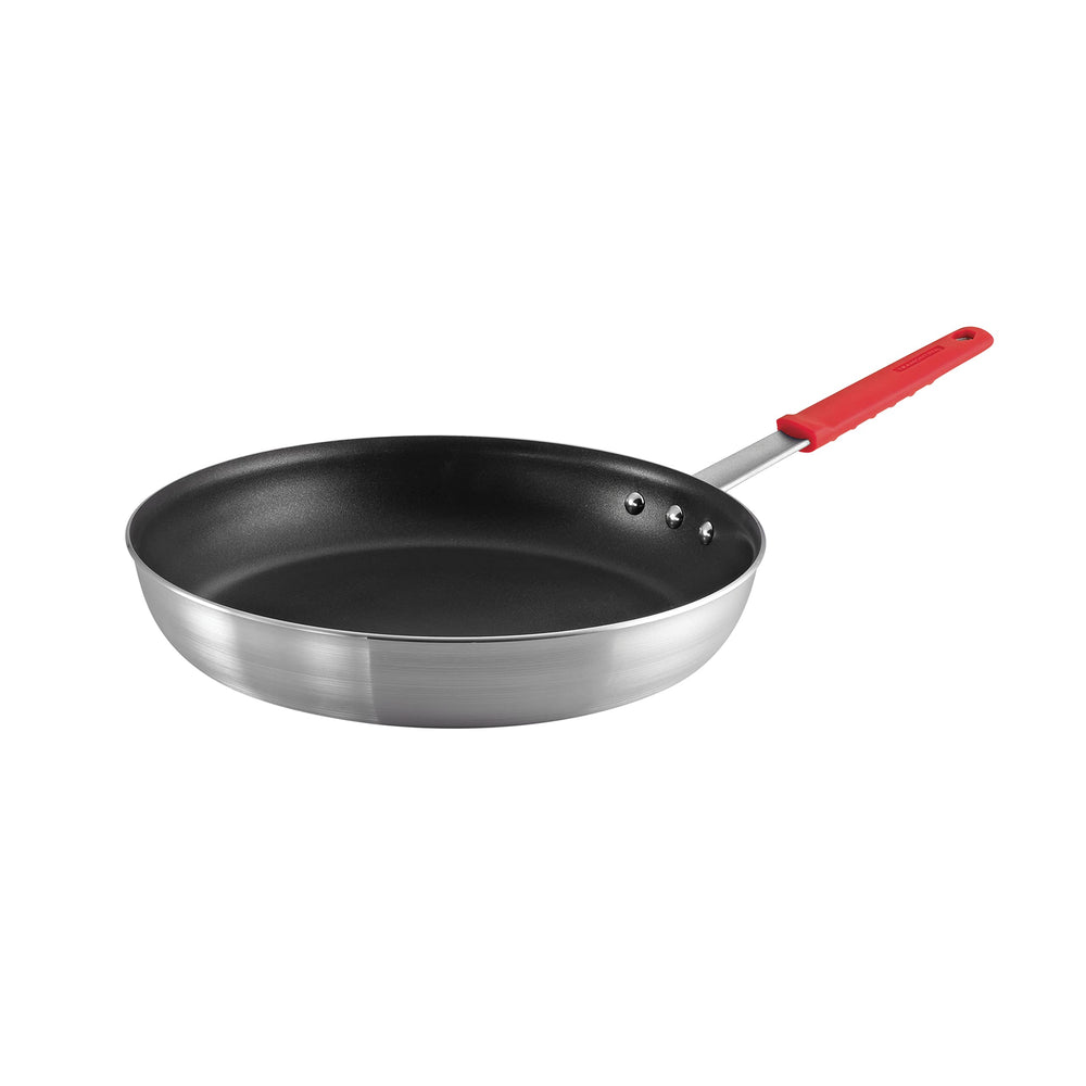 Tramontina fry pan front view showing wide cooking surface and professional build benefit