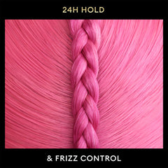 TRESemmé being sprayed onto styled hair to lock shape and reduce frizz
