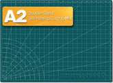 Tujurich cutting mat front view showing large workspace and grid to improve layout
