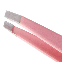 Tweezerman tea rose slant tweezer close-up showing precise edge for clean brow shaping