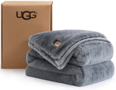 UGG plush throw front view showing grey blue color and cozy appeal