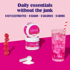 Ultima Replenisher open canister revealing raspberry electrolyte powder for quick use