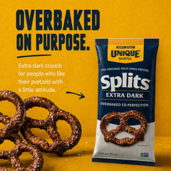 Unique Snacks pretzel in hand for scale demonstrating sizable crunchy split and snackability