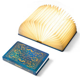 Uniwolk book lamp front cover showing gold foil and decorative design, elegant shelf accent