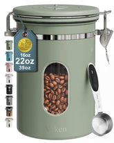 Veken canister front view showing sleek stainless steel and compact shape for countertop storage