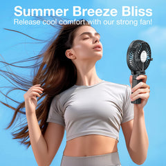 VersionTECH handheld during outdoor use, portable personal cooling benefit
