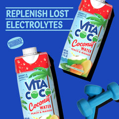 Vita Coco on a beach towel conveying tropical refreshment outdoors