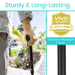 Vive folding cane height adjustment close-up showing telescoping pin for personalized fit