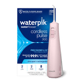 Waterpik Cordless Pulse 3100 front view showing pink body and tip for portable convenience