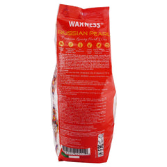 Waxness tub beside a tape measure showing 2 kg scale for salon capacity