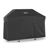 Weber premium cover front view protecting grill from weather and dust