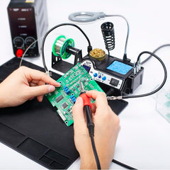 WEP soldering iron in holder demonstrating secure rest and quick access benefit