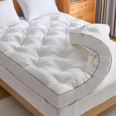 WhatsBedding topper front view showing plush pillow top and neat fit
