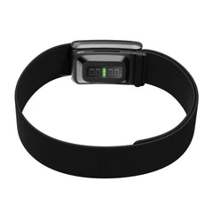 WHOOP bicep band worn on upper arm during workout demonstrating stable tracking