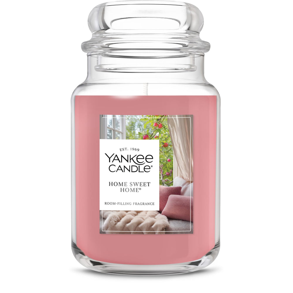 Yankee Candle front view of Home Sweet Home jar showing cozy label and size benefit