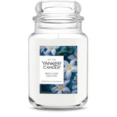 Yankee Candle front packaging showing jar and floral label, enhances room ambiance