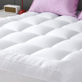 YUGYVOB front view of queen mattress topper showing plush surface and secure fit