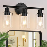 Zarbitta front view vanity light showing three clear glass shades and balanced illumination benefit