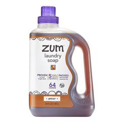 Zum front label on 64 oz amber laundry soap showing brand and scent benefit