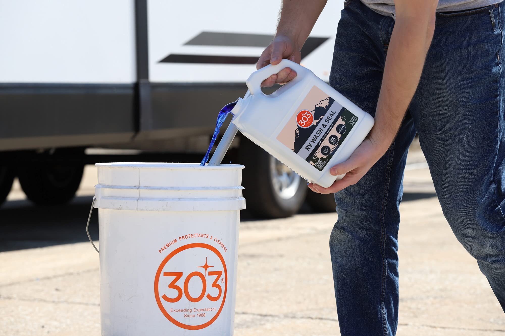 303 Products water sheeting off RV surface reducing spots and speeding drying
