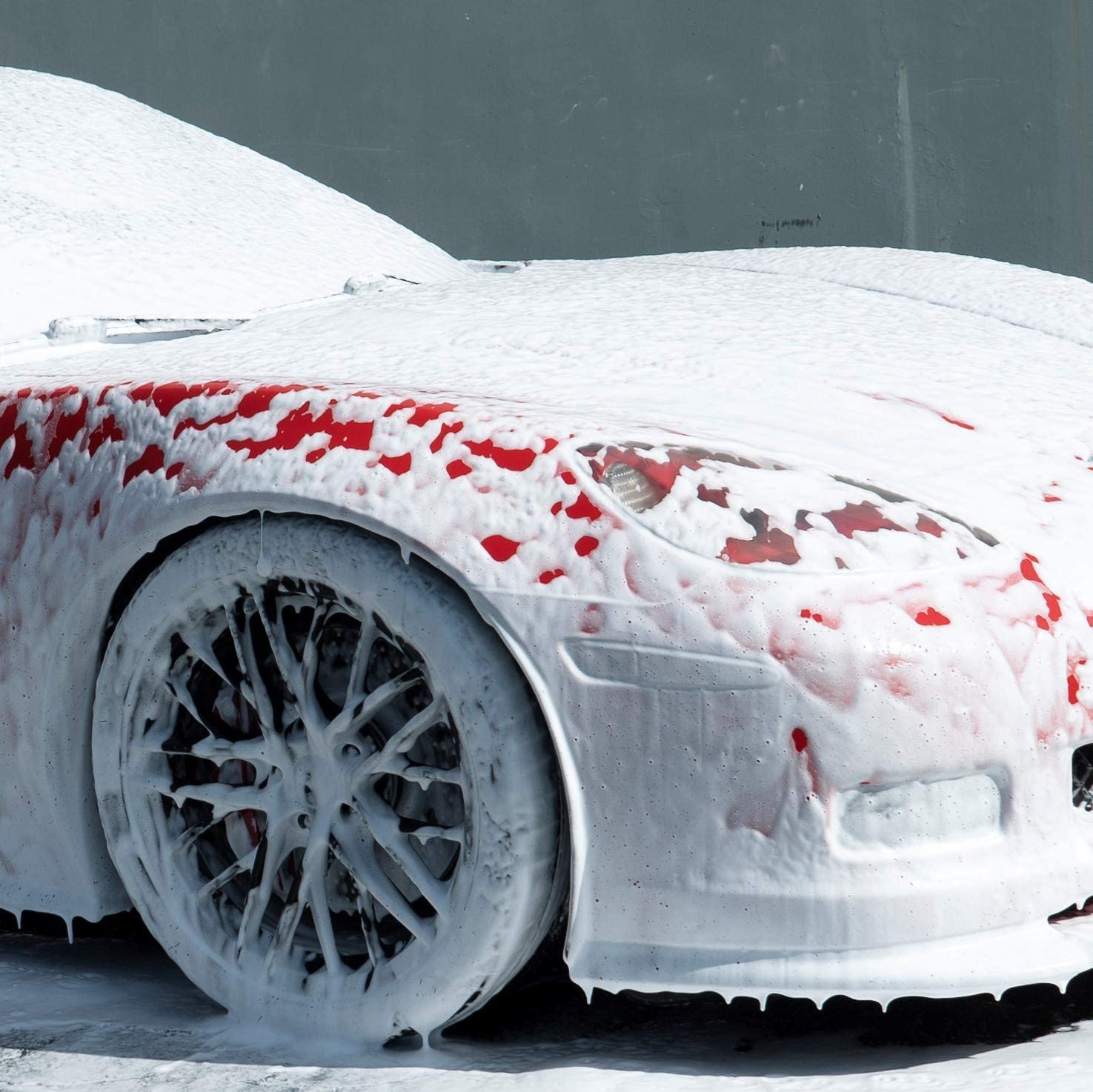 3D pink car soap demonstrating wash mitt glide across paint for scratch reduction