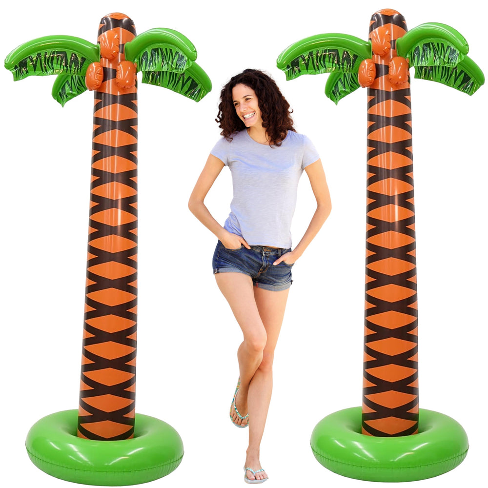4E's Novelty palm trees used as photo booth props creating a lively tropical backdrop