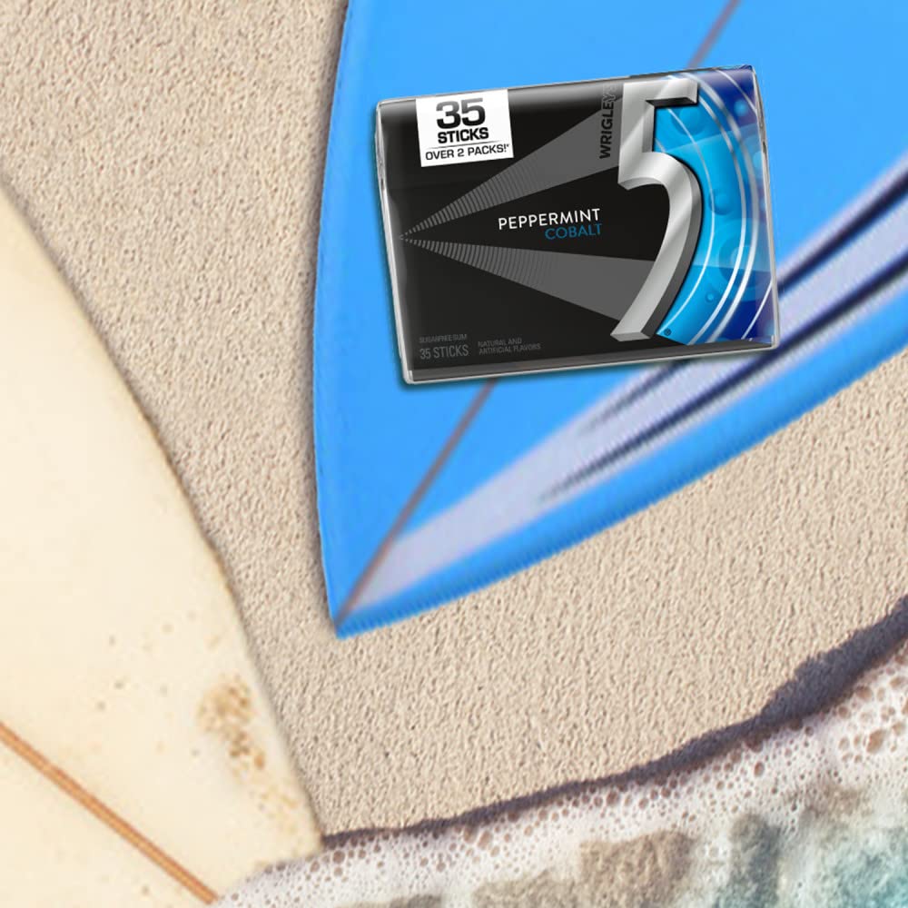 5 Gum Peppermint Cobalt on a desk with headphones showing energizing pick‑me‑up benefit