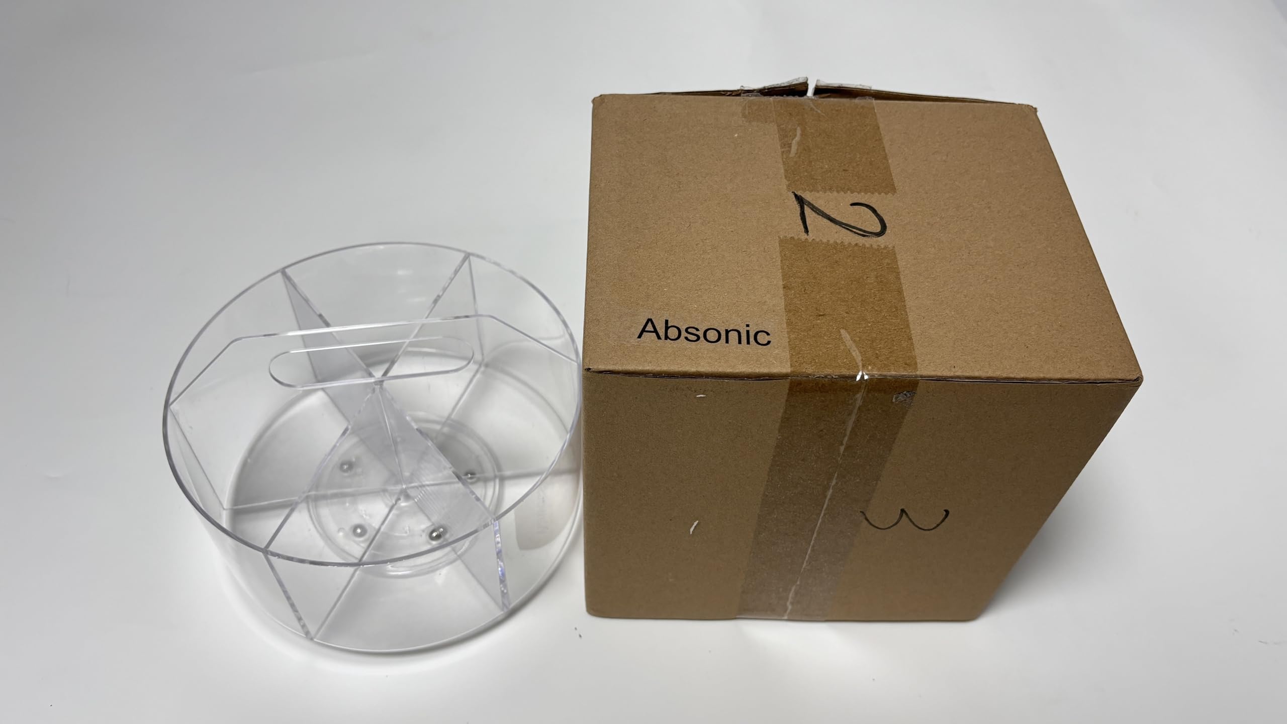 Absonic wiped-clean acrylic surface showing low-maintenance benefit