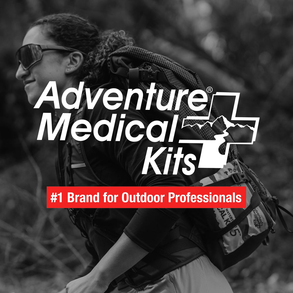 Adventure Medical Kits size comparison with water bottle showing ultralight packability
