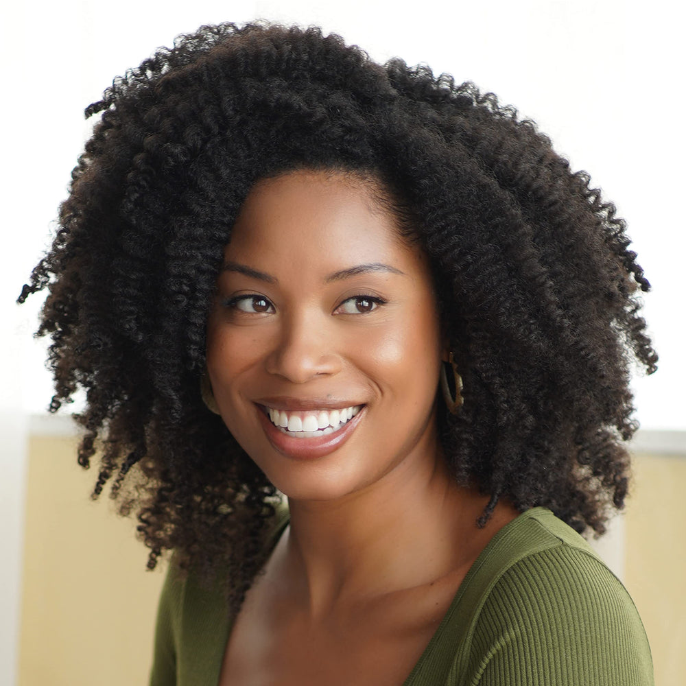 African Pride three-pack stacked on a bathroom shelf for routine-ready convenience