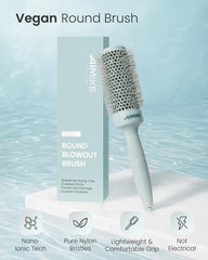 AIMIKE brush in use blow-drying hair to create volume and smoothness
