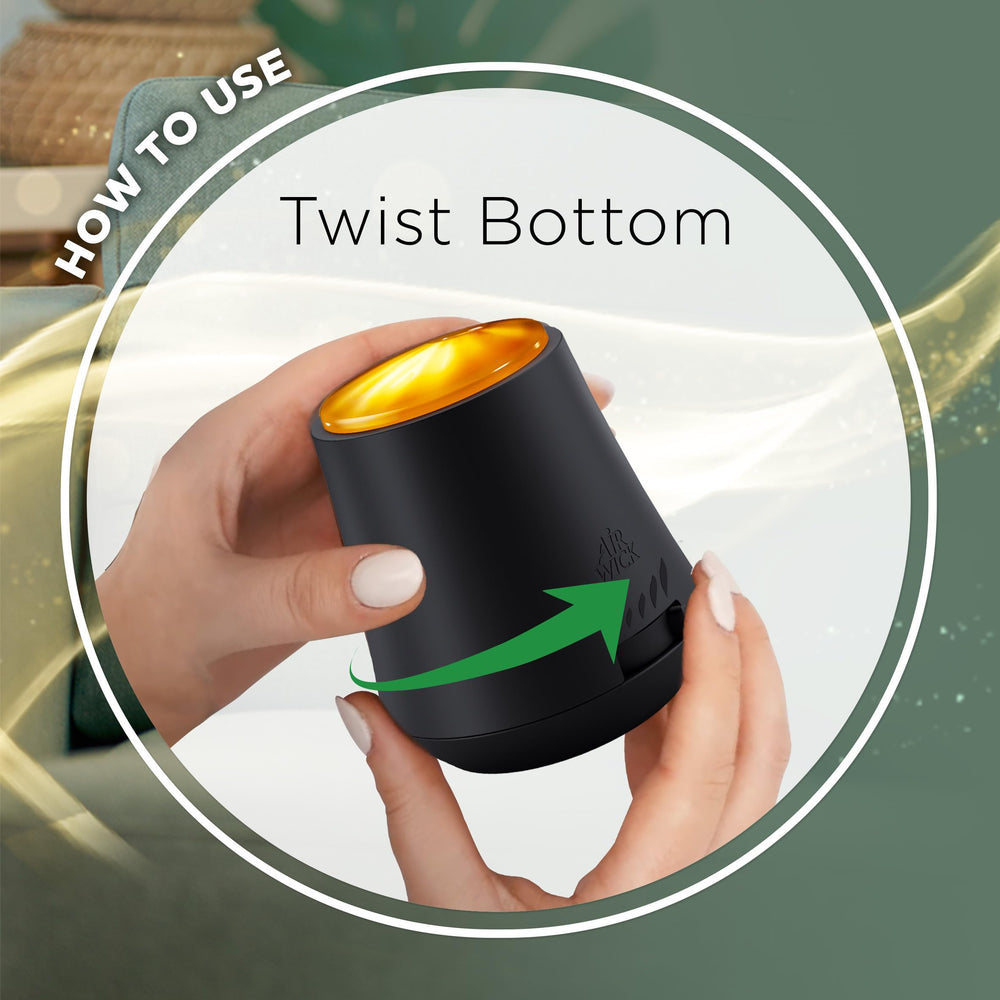 Hand holding Air Wick refill for scale, demonstrating compact, travel-friendly benefit