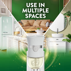 Air Wick warmer plugged in on living room wall dispersing balanced fragrance