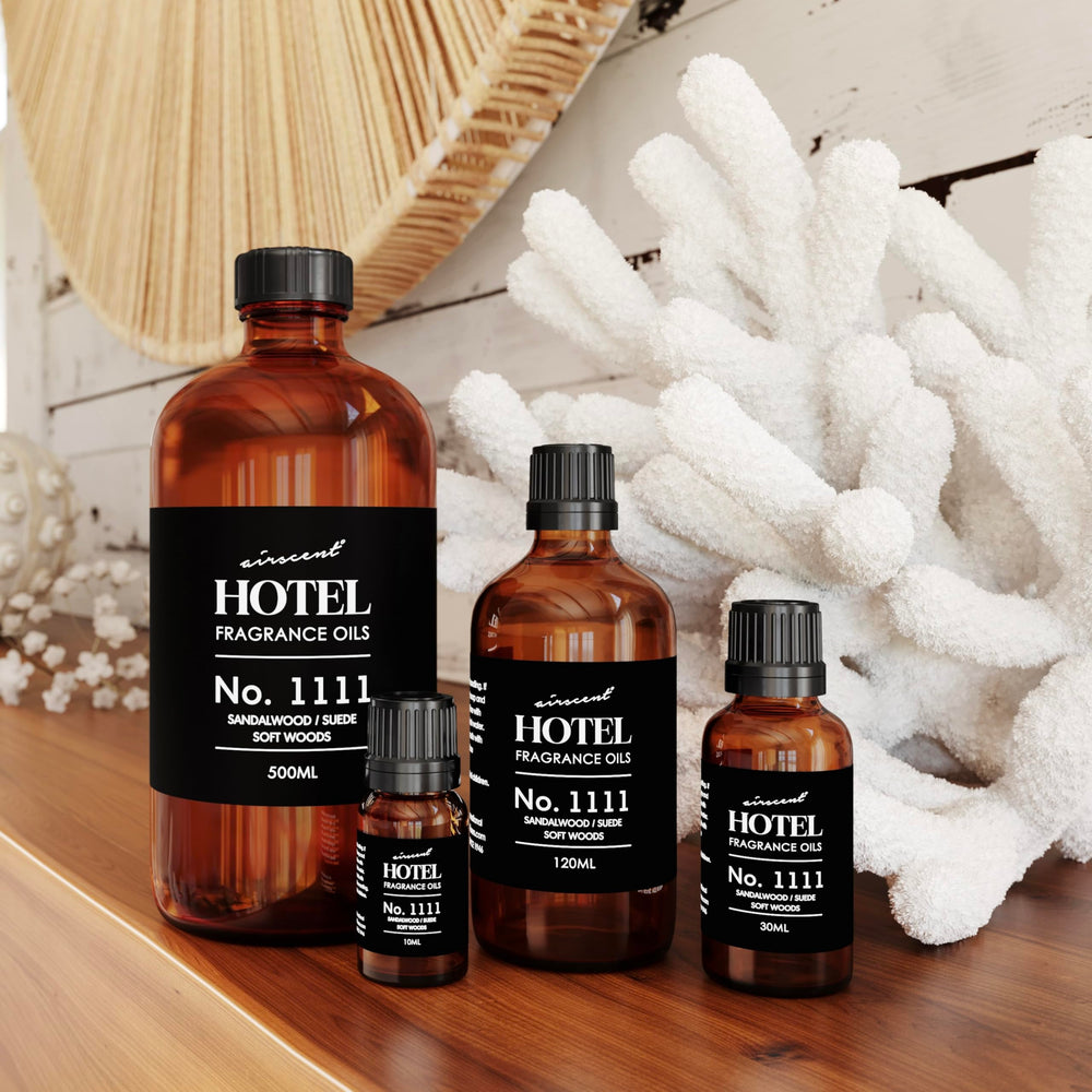 Air-Scent 120 mL bottle beside common objects showing compact, travel-friendly size