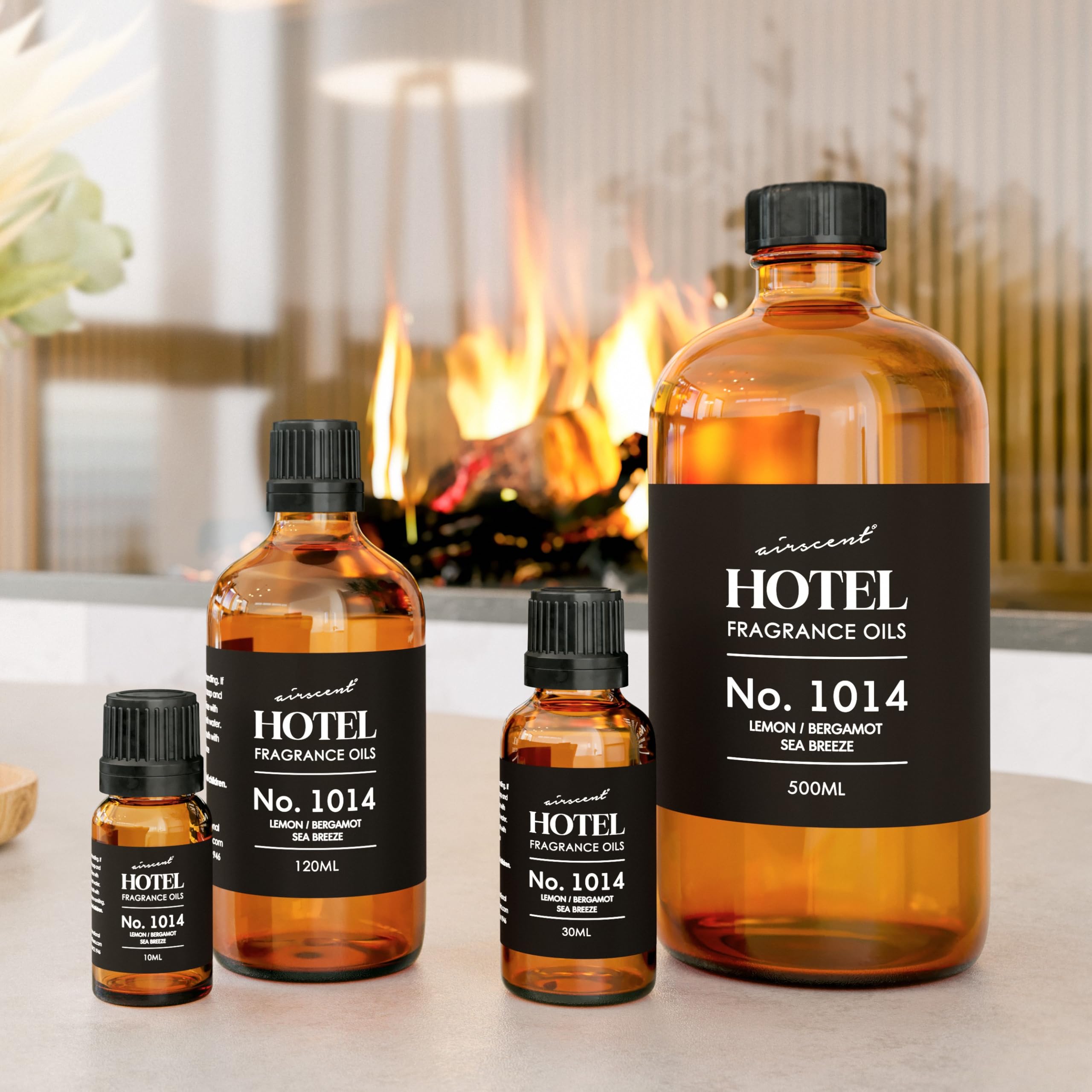 Air-Scent bottle next to candle supplies showing compatibility with crafts