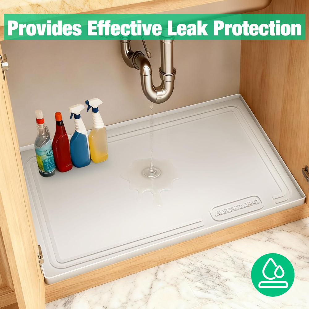 Aisslro installed under sink with bottles organized and cabinet base protected