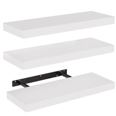 AMADA HOMEFURNISHING front view of three white floating shelves showing tidy display benefit