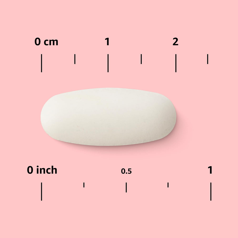 hand holding the Amazon Basics bottle to show scale and the 240-tablet supply for purchase perspective