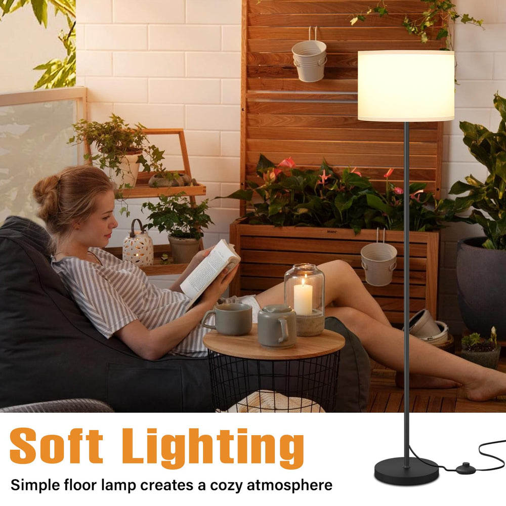 Ambimall placed beside recliner for cozy reading illumination