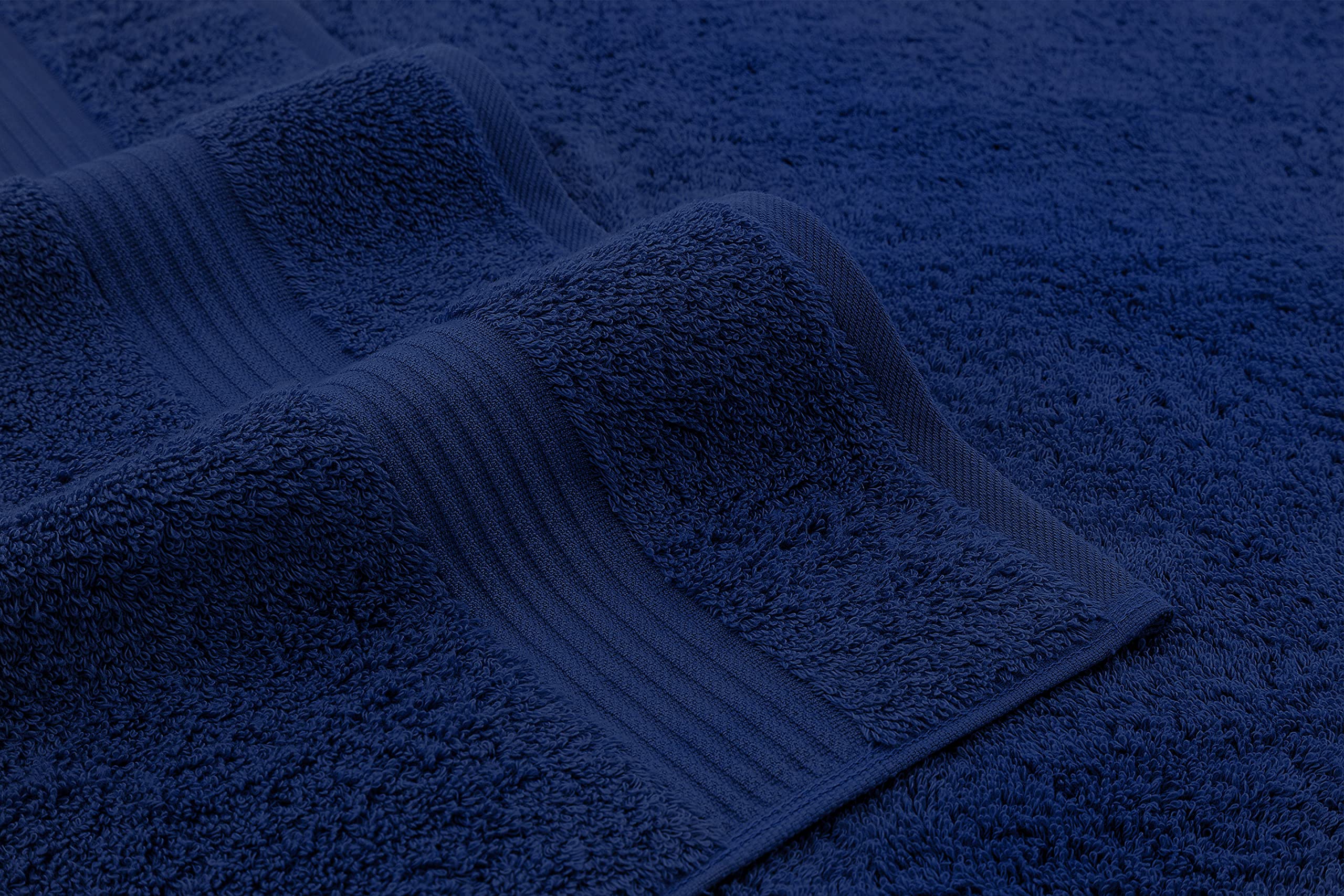 American Veteran Towel in use drying hands to demonstrate quick absorption