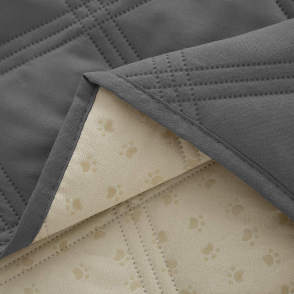 Ameritex on sofa in use protecting upholstery from spills