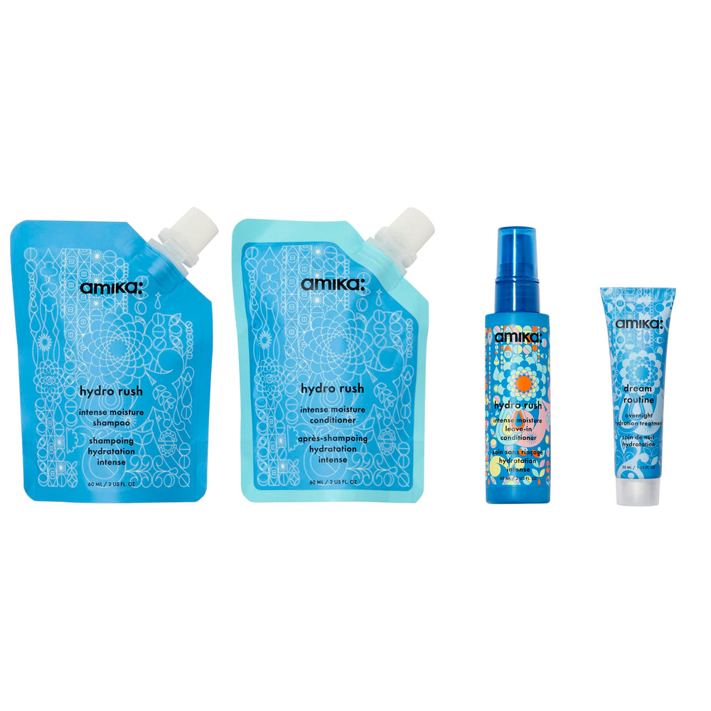 Amika Hydro Rush shampoo pump close-up showing easy dispensing for travel