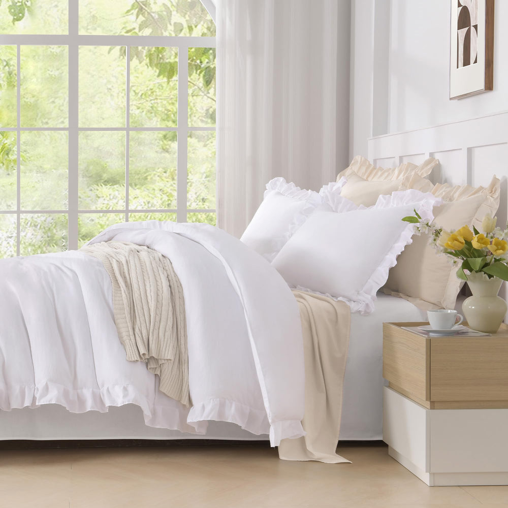 Andency layered on bed for size comparison showing fit and lightweight layering benefit