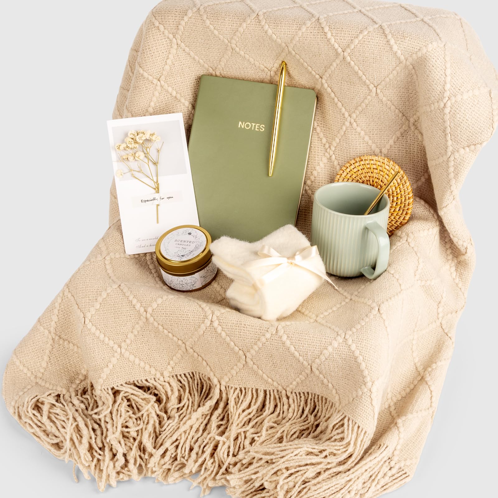 Anforsun accessories arrangement displaying candle, notebook, pen and socks