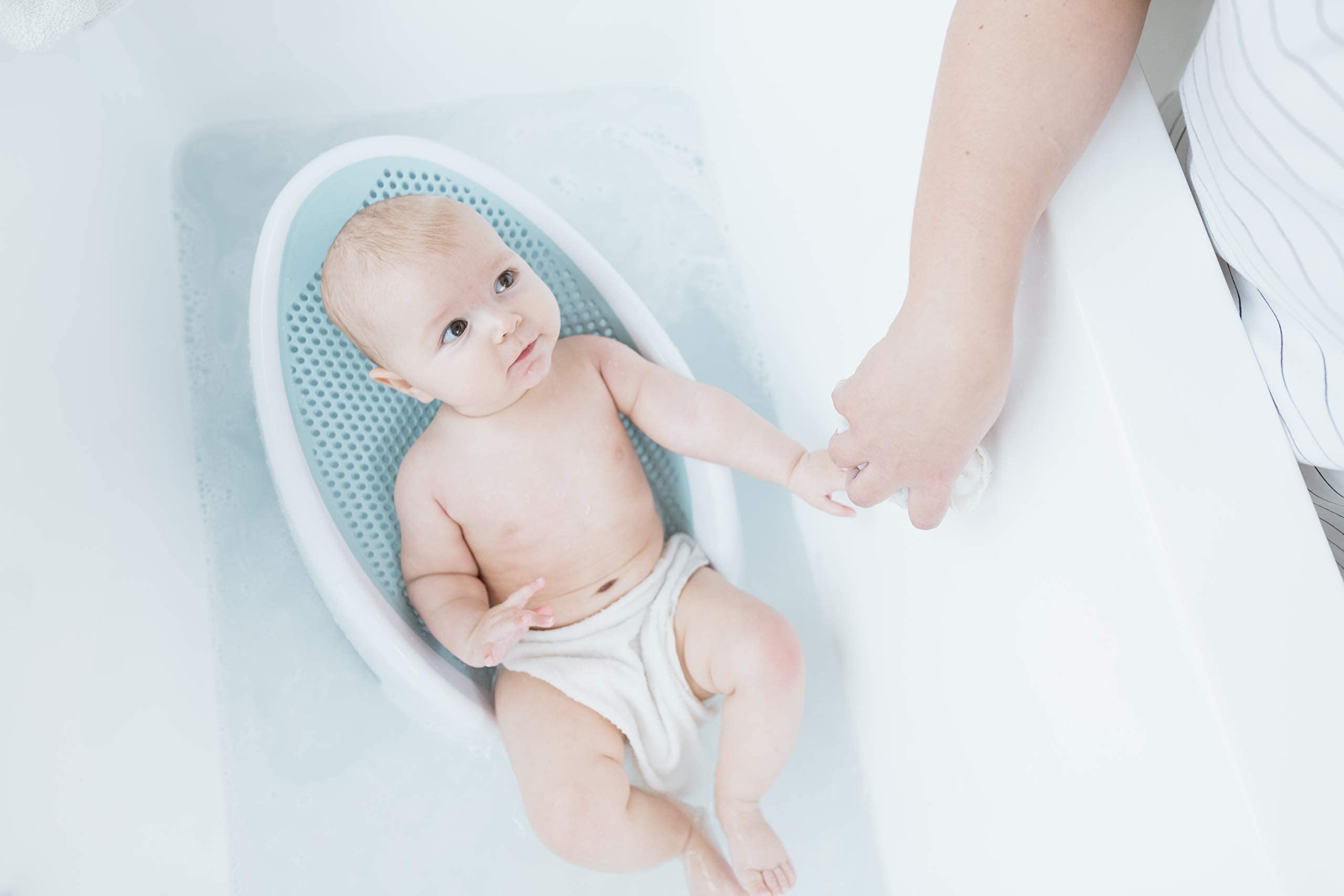 Angelcare rinser in use rinsing baby doll hair reducing splash and worry