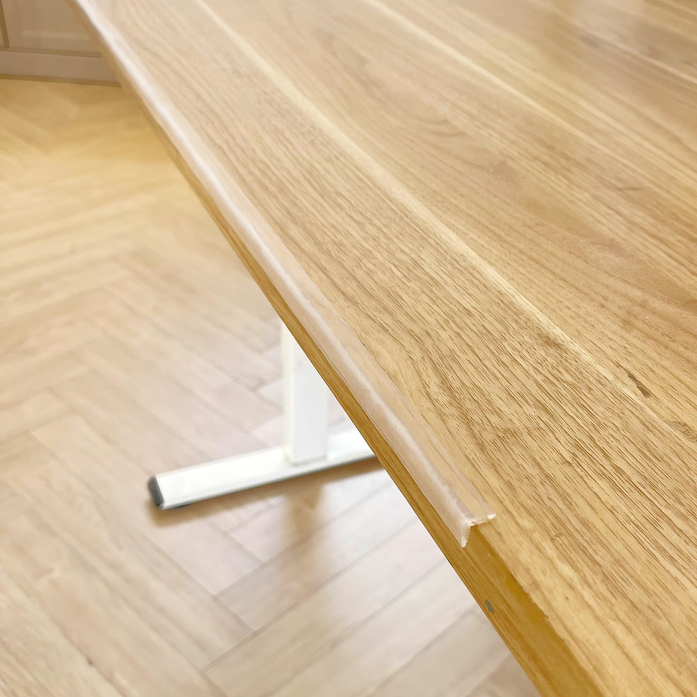 Angloria adhesive back peeled showing easy install and no-trace removal benefit